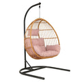 Hängesessel Rattan Rosa Kissen Stahlgestell